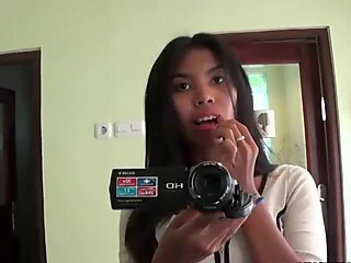 Sexy brunette Asian babe fools around yon be imparted to murder camera